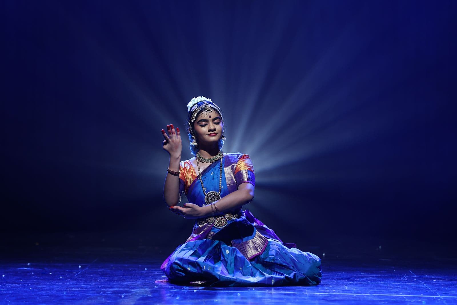 Jahnavi in a spotlight at her Arangetram