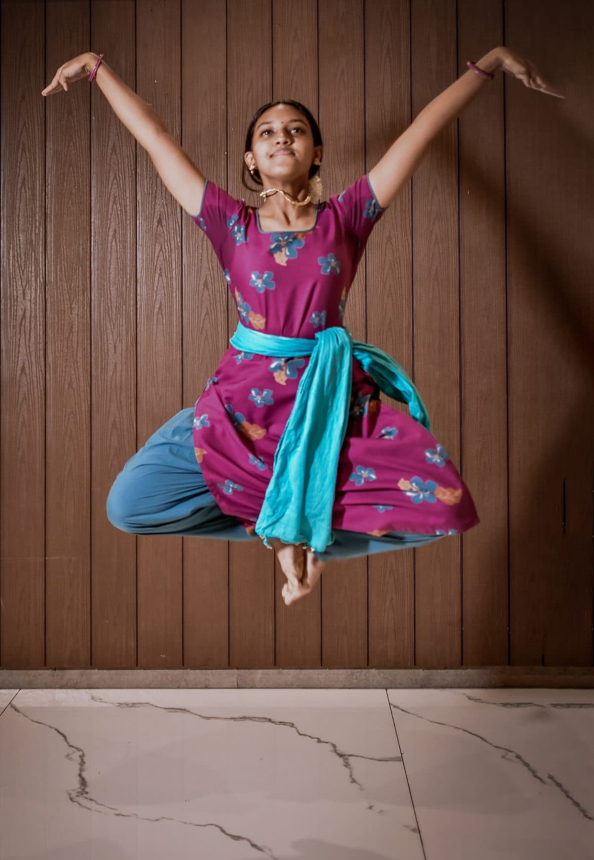 A student in a one-to-one Bharatanatyam class (1 of 2)